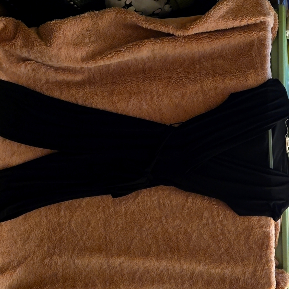 Black jumpsuit with belt size large.
